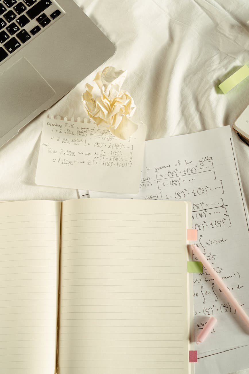 handwritten formula on paper